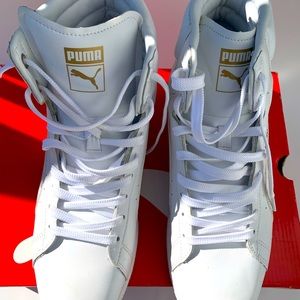 White puma high-top sneakers with gold lining